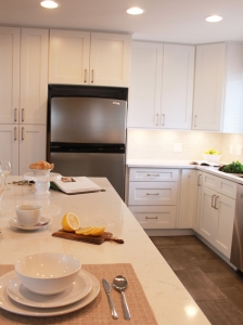 white granite countertop with white kitchen cabinets
