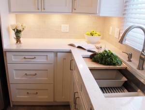 white kitchen cabinets with granite countertop