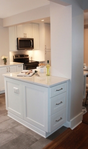 white kitchen cabinets with granite countertop